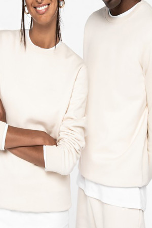 Ivory round neck sweatshirt. 85% organic cotton and 15% post-consumer recycled polyester.