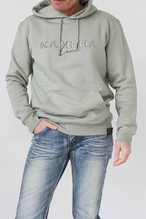 SUDADERA CON CAPUCHA VERDE ALMENDRA 85 % algodón orgánico / 15 % poliéster reciclado posconsumo